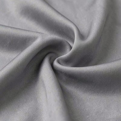 soft folds of grey silk fabric