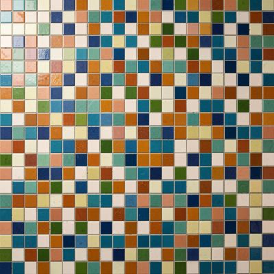 a wall of small square tiles in one colour