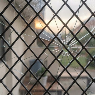 broken safety glass in a lattice pattern