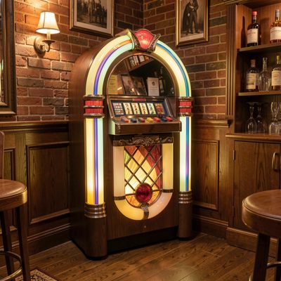 a jukebox in a corner of a bar