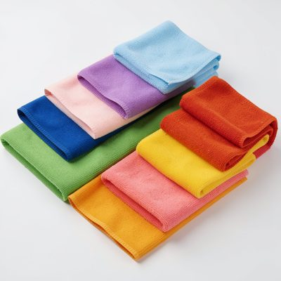 a set of colour coded cleaning cloths