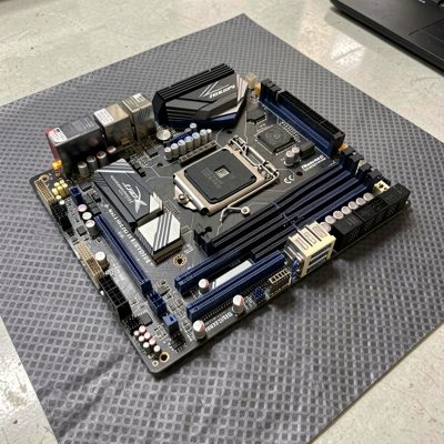 a motherboard laid out on an antistatic mat
