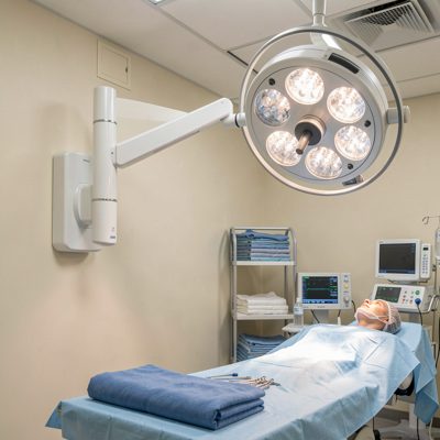 a wall mounted x ray arm in a surgery