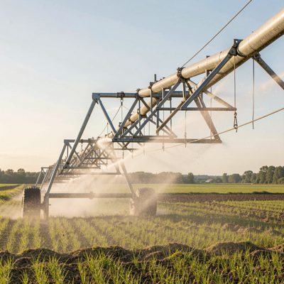 an irrigation boom spraying across a field