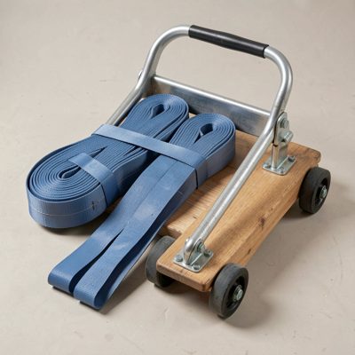 a set of furniture straps and a dolly