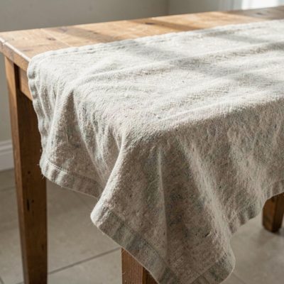 a removal blanket over a table corner