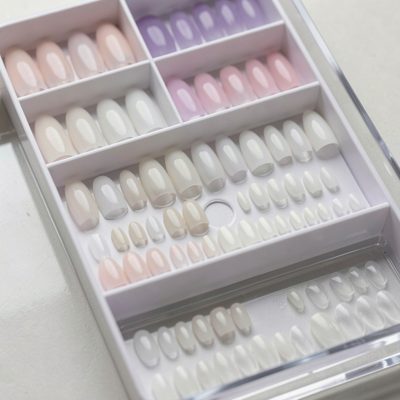 a tray of nail tips in different lengths