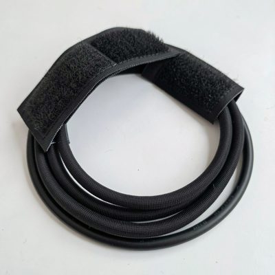 a fibre patch lead looped and secured with hook and loop tape