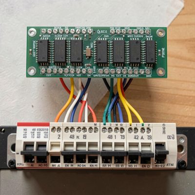 a patch panel directly above a 48 port switch with short leads