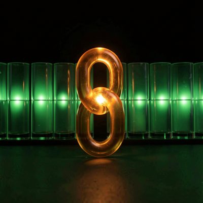 a single amber link light among a row of green ones