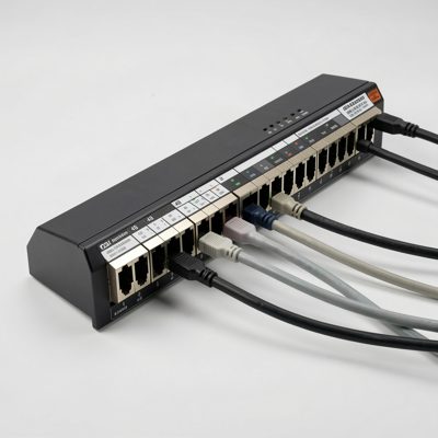 a 48 port switch at an angle with cables sweeping to the right