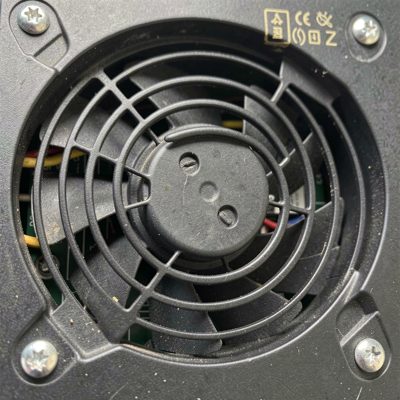 a power supply fan grille photographed close