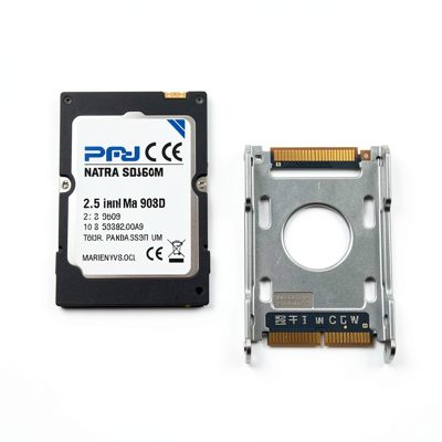 a 2.5 inch sata ssd beside its mounting bracket
