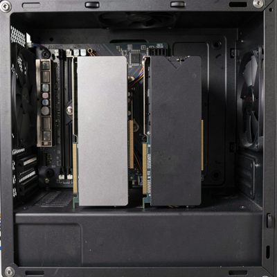 two graphics cards installed side by side in a case, no logos, no text, no branding
