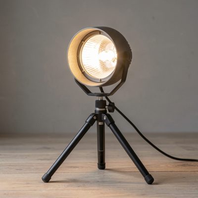 a light being adjusted on a stand