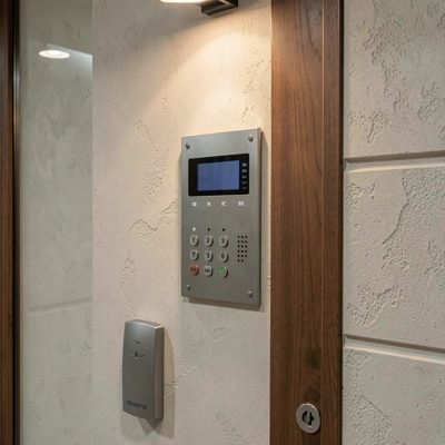 a flat entrance with intercom panel