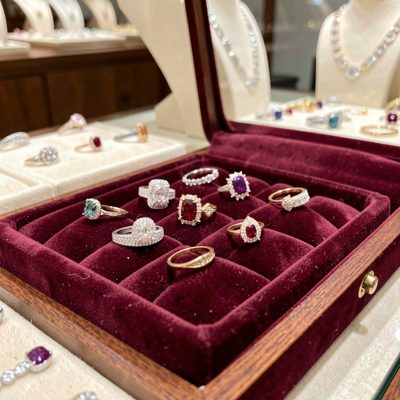 a jewellery display with rings on a velvet tray