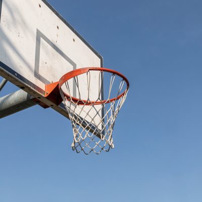 a basketball hoop against a clear sky