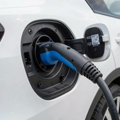 an electric vehicle charging port with the cable connected